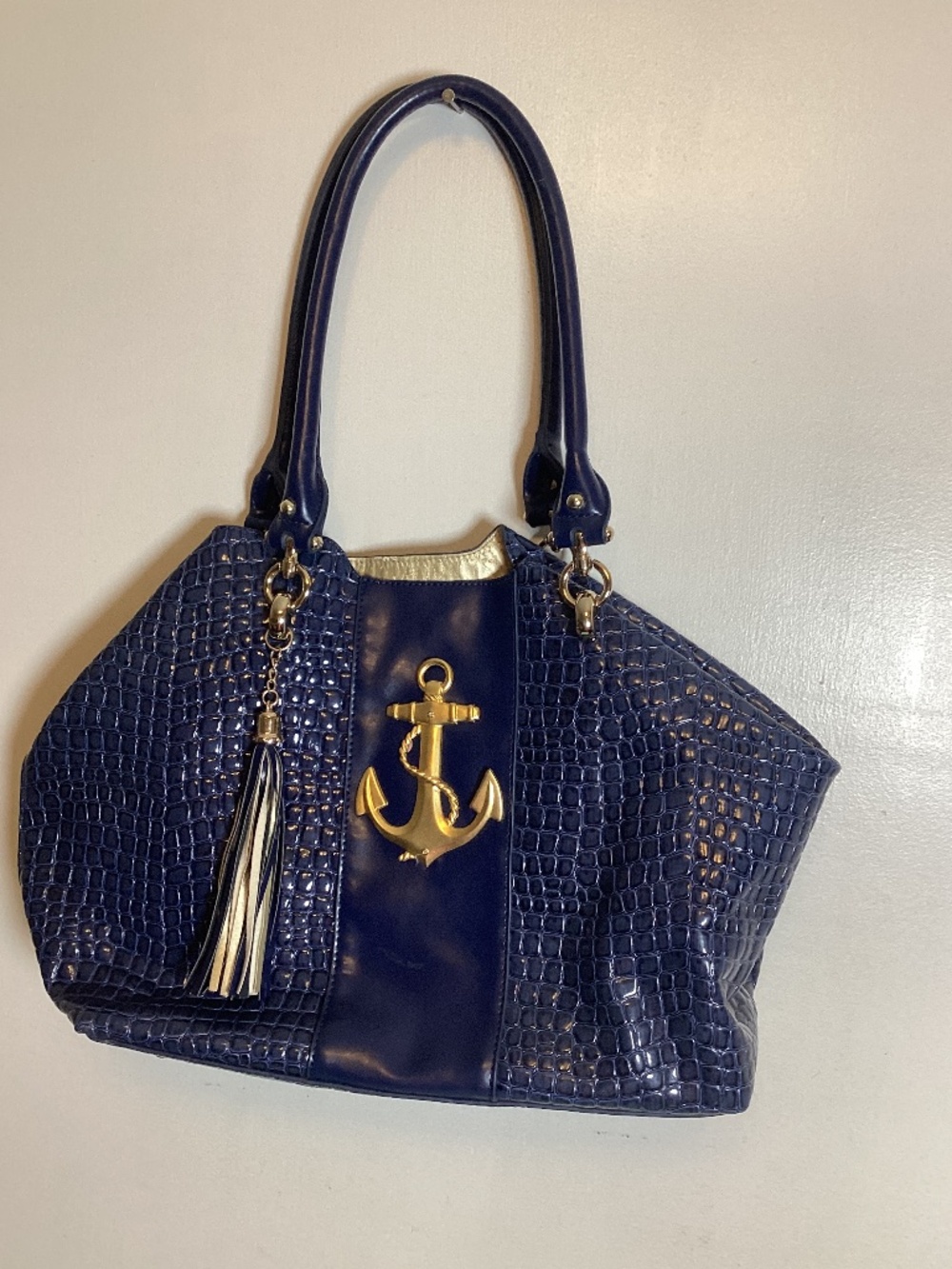 Bosom Buddy faux croc leather tote bag with large metal anchor with tassels
